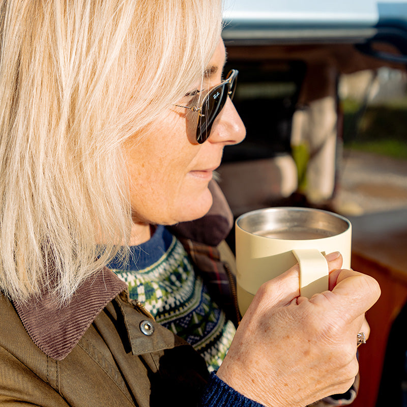 12oz-rise-mug-u7 12oz_rise_coffee_mug_wax_yellow_woman_drink_closeup_square.jpg