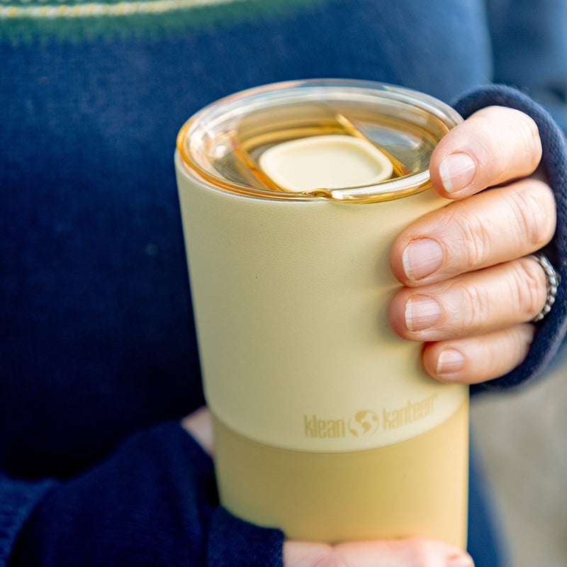 daily-on-the-go-set-t6 16oz_rise_tumbler_wax_yellow_closeup_hand_lid_square.jpg