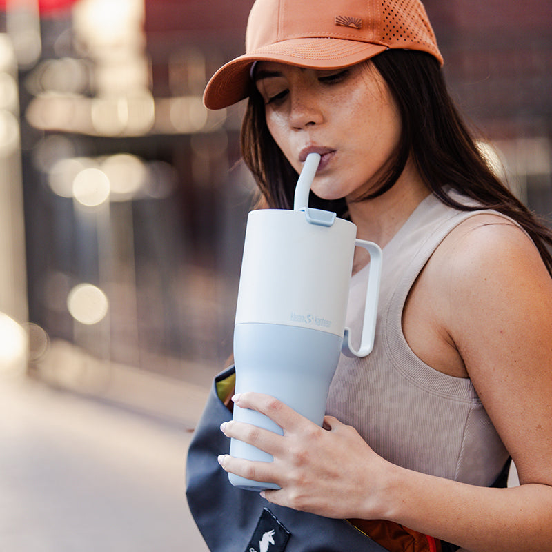 36oz-rise-tumbler-with-straw-lid-a9 36oz_rise_tumbler_straw_girl_sip_square.jpg