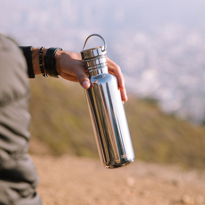 27oz-reflect-with-bamboo-cap-l6 K27SSLRF-MS-BAMBOO_reflect_bottle_hand_lifestyle.jpg