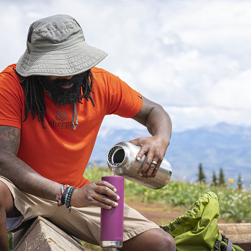 64oz-tkwide-with-loop-cap-c8 tkwide_64oz_bottle_backpacker_mountains_filling_square.jpg