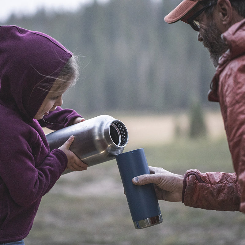 64oz-tkwide-with-loop-cap-c8 tkwide_64oz_bottle_girl_dad_filling_square.jpg